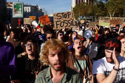 Radical climate protesters in Portugal storm building, urge economy minister to resign