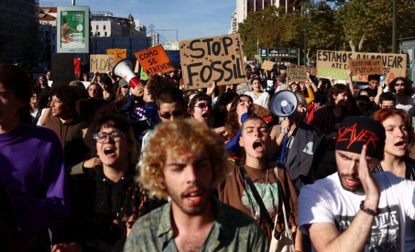 Radical climate protesters in Portugal storm building, urge economy minister to resign