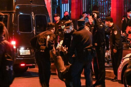 Chinese police flood streets in attempt to crack down on intensifying protests