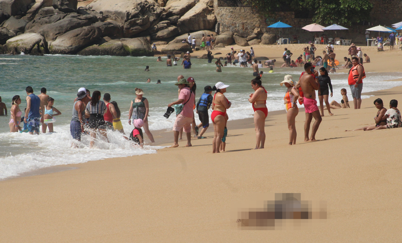 Mexico beachgoers at popular tourist area find 3 dead bodies with torture marks washed ashore