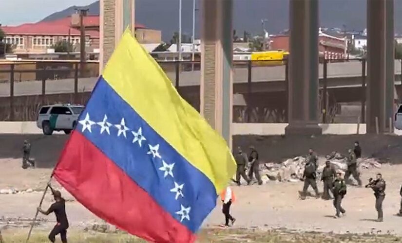 Illegal migrants wave Venezuelan flag after crossing US southern border, attack Border Patrol agents