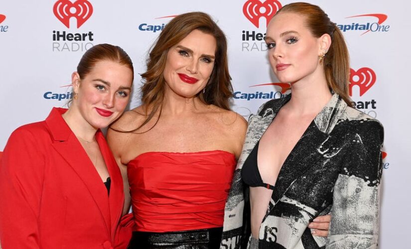 Brooke Shields, 57, rocks racy red top to JingleBall as she matches with daughters: ‘A Cool Mom’