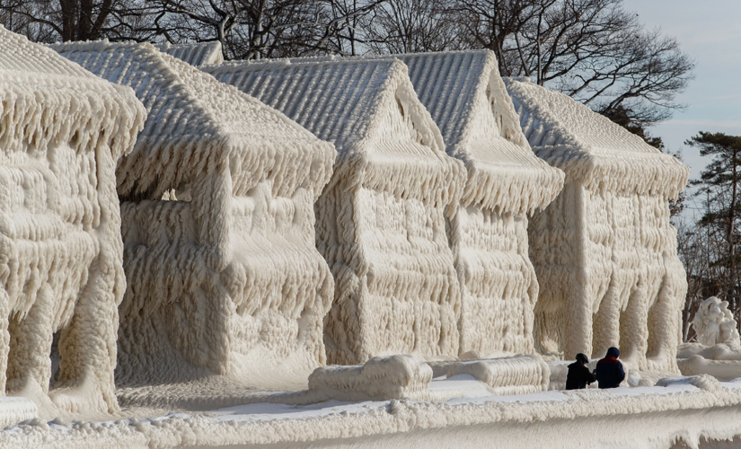 Amazing photos show homes in Fort Erie, Ontario, near Buffalo, frozen over following winter storm