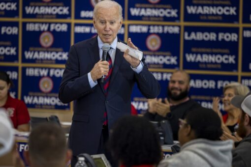 Biden and Trump help Warnock, Walker by staying out of Georgia