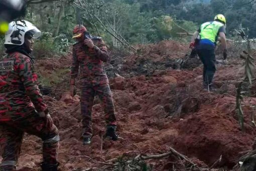 Malaysian landslide kills 18 at campground, rescuers search for 15 others