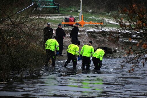 Three children die after falling into icy lake as Britain grapples with winter weather