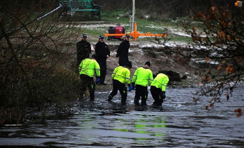 Three children die after falling into icy lake as Britain grapples with winter weather