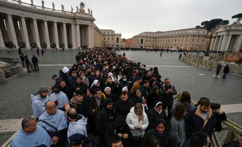 Crowds gather as Pope Emeritus Benedict XVI’s body lies in state at Vatican