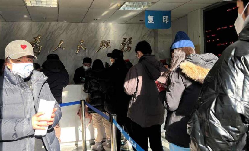 Chinese citizens eager to renew passports after China drops border controls