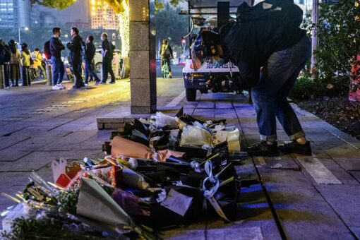 Chinese police arrest man who plowed into crowd, killing 5 people, injuring others