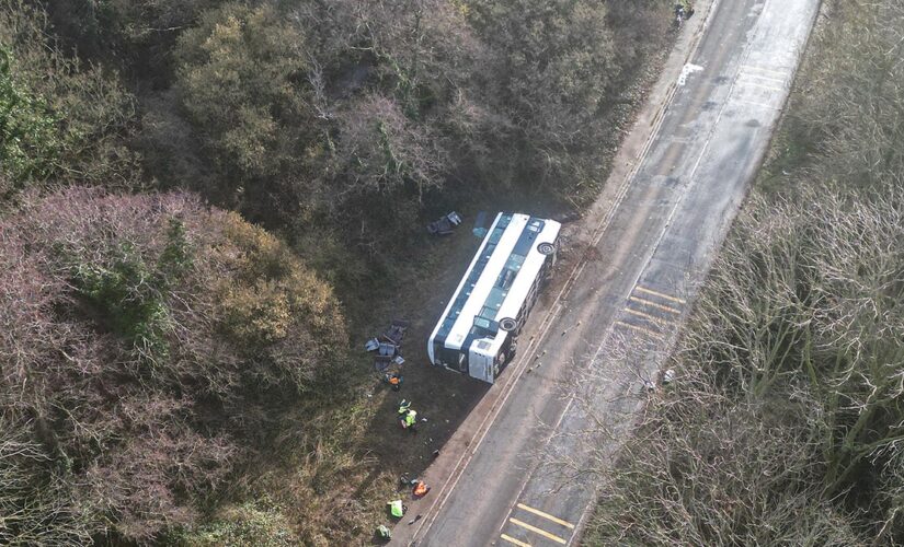 Double-decker bus in England overturns with 70 passengers aboard, dozens treated as ‘walking wounded’: police